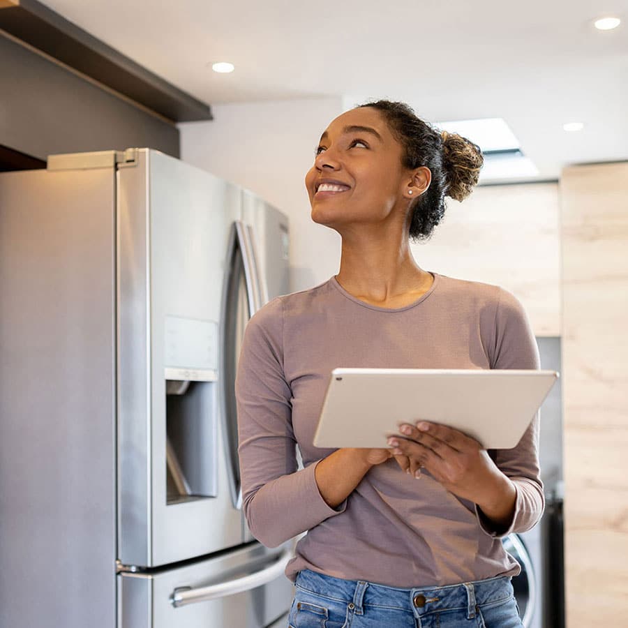 Woman in Chicago Controllling Her Smart Home with Phone