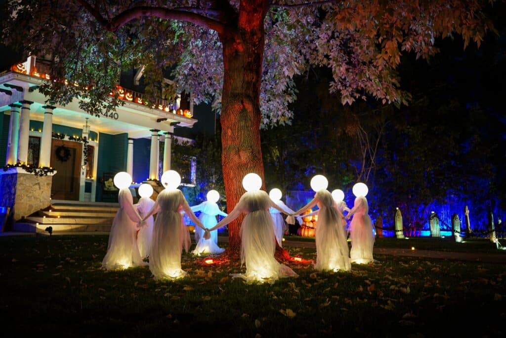 Image of a large house extensively decorated for Halloween.